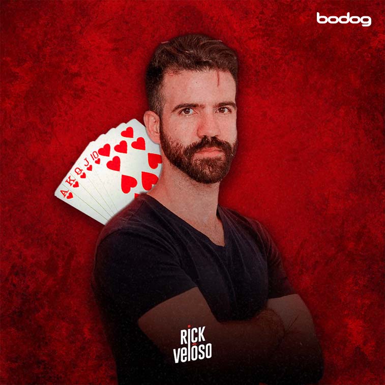 a man with a beard and a deck of cards on his back